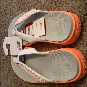 New Balance Kids' pink  and grey Sandals